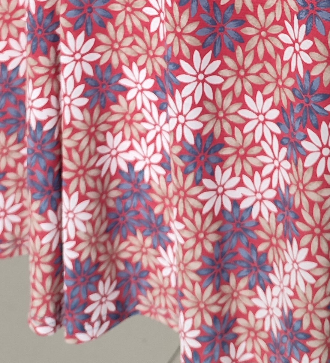 FALDA CON VUELO ESTAMPADO FLOR